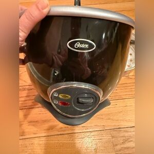 Oster Black Electric Rice Cooker with Indicator Lights-never used!